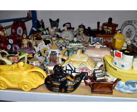 A COLLECTION OF THIRTY SEVEN NOVELTY TEAPOTS, comprising a Carlton Ware S.S. Carlton ship, a miniature Cardew teapot, an earl