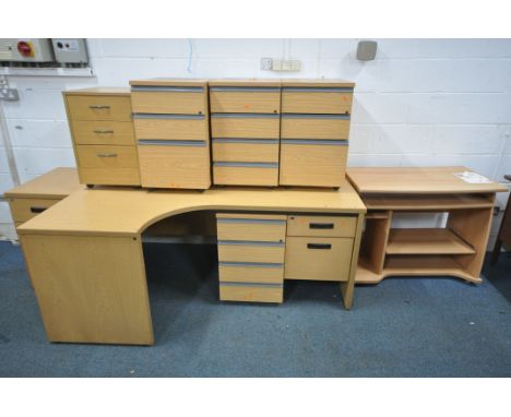 A LARGE SELECTION OF LIGHT WOOD OFFICE FURNITURE, to include six various desks and seven various under desk filing cabinets (