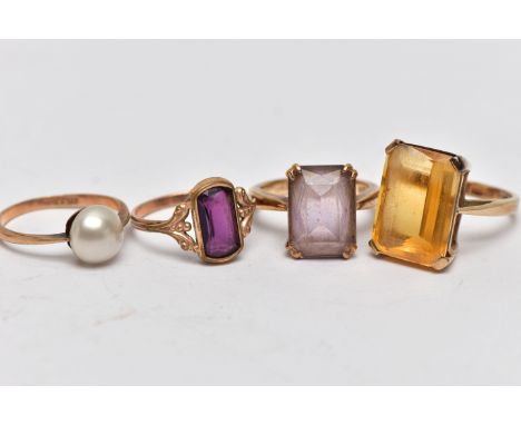 FOUR GEM SET RINGS, the first a 9ct yellow gold ring, set with a large rectangular cut citrine, approximate dimensions length