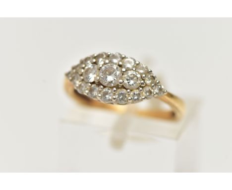 AN 18CT GOLD DIAMOND CLUSTER RING, a navette shaped cluster ring comprised of nineteen round brilliant cut diamonds, approxim