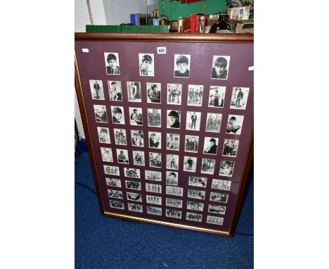 A FRAMED SET OF SIXTY BEATLES BUBBLE GUM CARDS, some cards bear facsimile signatures, the cards have previously been stuck in