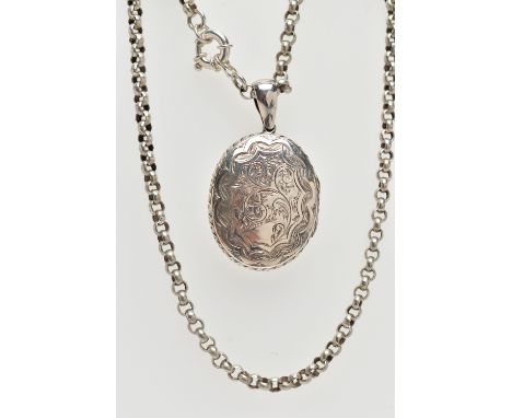 A LATE VICTORIAN SILVER LOCKET AND A WHITE METAL BELCHER CHAIN, the oval hinged locket, decorated with a floral and foliate p