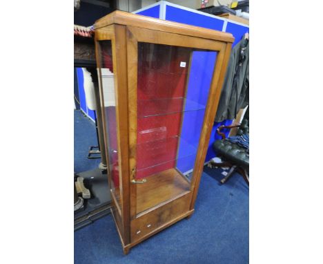 AN ART DECO WALNUT SINGLE DOOR CHINA CABINET, enclosing two glass shelves, width 70cm x depth 38cm x height 161cm (condition: