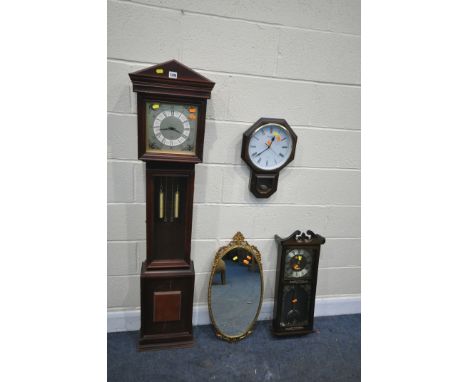 A MODERN MAHOGANY CASED GRANDAUGHTER CLOCK, with two dummy weights, a president wall clock, another wall clock, and a gilt fr
