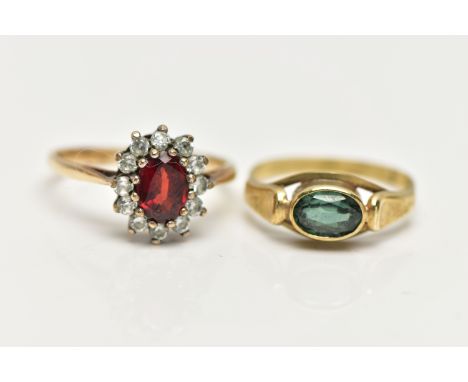 TWO GEM SET RINGS, the first a 9ct yellow gold cluster ring, set with a central claw set, oval cut garnet in a surround of co