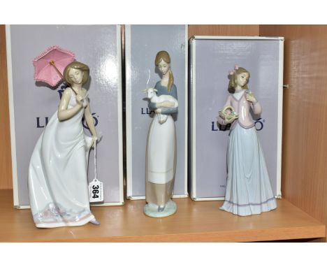 THREE BOXED LLADRO FIGURINES, comprising Afternoon Promenade 7636 Collectors Society 1995 limited edition,  Innocence in Bloo
