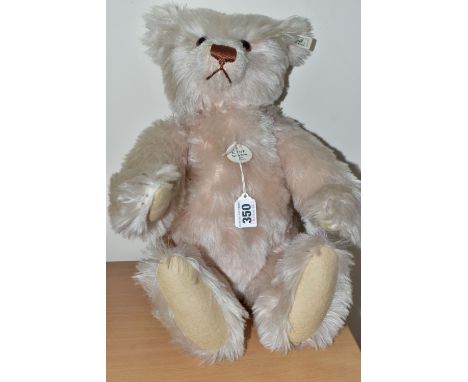 A STEIFF LIMITED EDITION 'TEDDY ROSE, 1927 REPLICA' TEDDY BEAR, numbered 1881/7000, with pale dusky fur, nude felt pads, grow