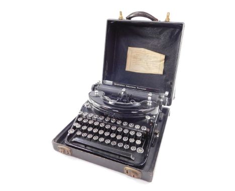 A vintage Remington "World Service" noiseless portable typewriter, with continental AZERTY keyboard, Srr. No. N950040, cased.