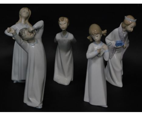 Five Lladro porcelain figures of children, the tallest 22cm high.