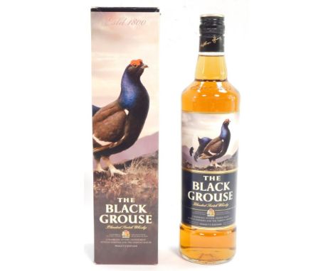 A bottle of The Black Grouse Blended Scotch Whisky, boxed.