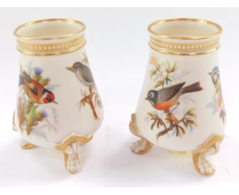 A pair of late 19thC Royal Worcester porcelain vases, each painted with birds, to include blue tits, thrush, etc., printed ma