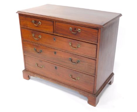 A George III mahogany chest, of two short over three long graduated drawers, raised on bracket feet, 81cm high, 95cm wide, 50