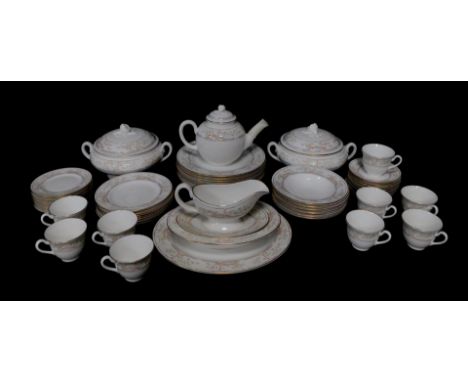 A Royal Worcester porcelain tea and dinner service decorated in the Lagoon pattern, comprising bullet shaped teapot, nine tea