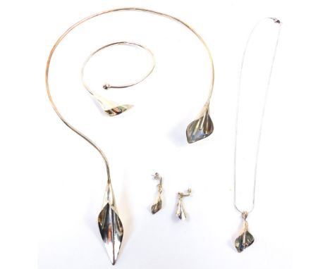 A silver lily jewellery set, comprising a bangle, torc necklace, drop necklace and a pair of earrings, with makers stamp, KFD