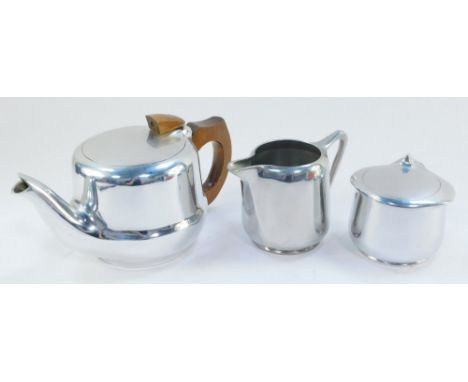 A Picquot ware three piece tea set, comprising teapot, cream jug and sucrier.