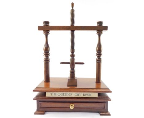 A Georgian style mahogany book press, with single frieze drawer, raised on bracket feet, 58cm high, 38cm wide, 21.5cm deep.