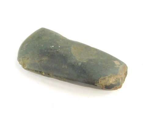 A Neolithic period polished axe head, purportedly found near Amesbury in Wiltshire, 11cm wide. 11cm x 4cm approx. 