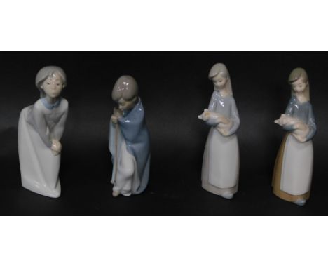 Four Lladro porcleian figures modlled girls, all standing, two holding piglets, 18cm high.