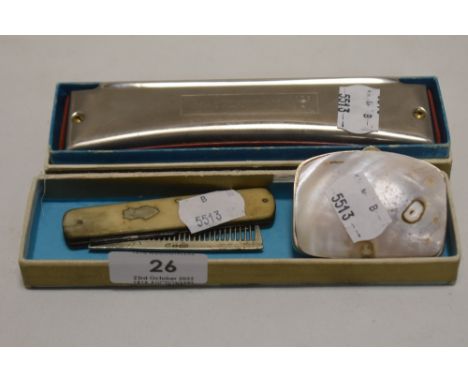 A selection of curios including mother of pearl coin purse, Masterwork harmonica and a bone handle pocket knife