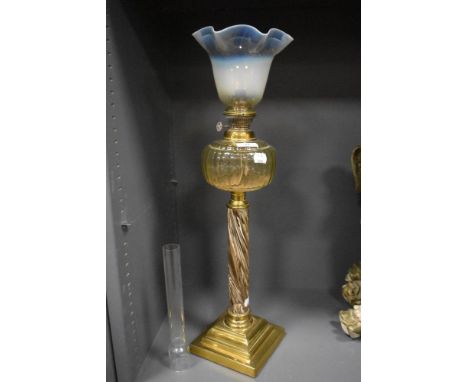 A fine Victorian oil lamp with brass base, ceramic shaft and vaseline glass shade 60cm tall with shade.
All parts of the lamp