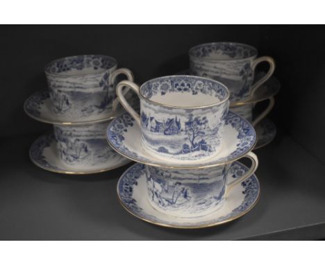 A set of modern Royal Tuscan breakfast tea cups and saucers with ploughing scene