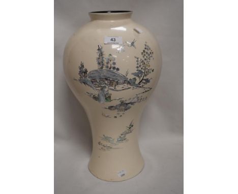 An oriental vase having lacquer work and mother of pearl design