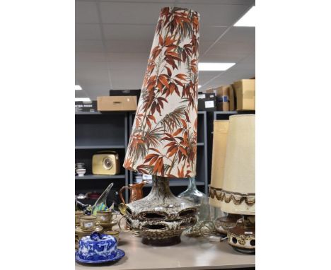 A large mid century floor lamp having bamboo pattern to shade.