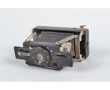 A Houghtons Ensignette No 2B De Luxe strut folding camera, 7.5 x 5cm format, a T.T. &amp; H Cooke Anastigmat f/6.3 focusing l