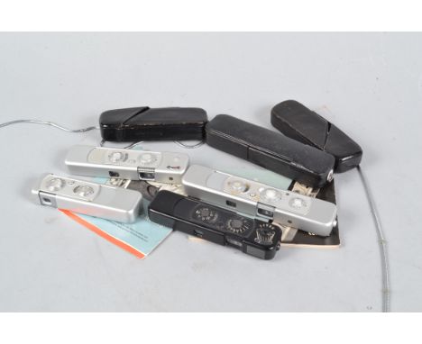 Minox Sub Miniature Cameras, a Minox B, cased, with cube flash attachment,manual, BL, A, with case, chain and C, with case an