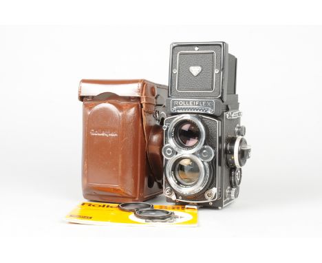 A Rolleiflex 2.8F K7F2 TLR Camera, serial no 2 457 266, body VG, two small dings to top of focusing hood, shutter working, me