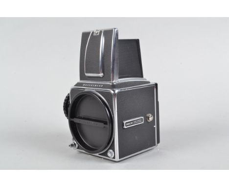 A Hassleblad 500CM Camera Body, chrome, serial no RI 1295341, body G-VG, light marks to tripod mount, minor scratches to chro