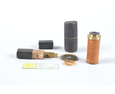 19th Century Pocket Microscopes,  cylindrical pocket microscope, in pasteboard case (1), simple lens set in brass in horn mou