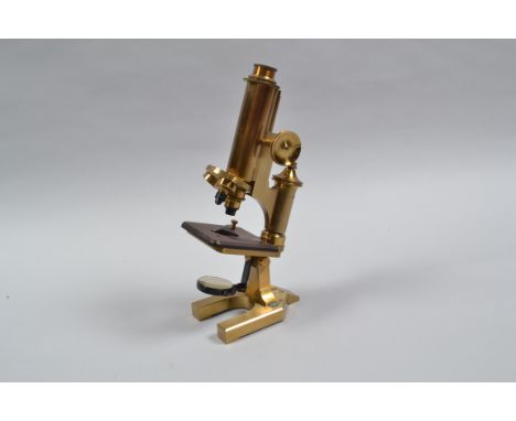 A Monocular Microscope, by R &amp; J Beck London, serial no 28954, lacqurered brass, German style student type, with horeshoe