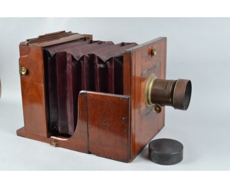 A Large Mahogany Tailboard Camera, 12 x 12in, square cornered, straight maroon bellows, no focusing screen, rear crank focusi