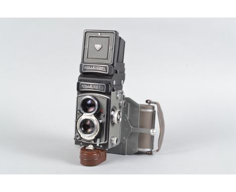 A Rolleicord Vb Made for Phillips TLR Camera with Rolleicopi Head &amp; Polaroid Back, grey, serial no 2610611, shutter sligh