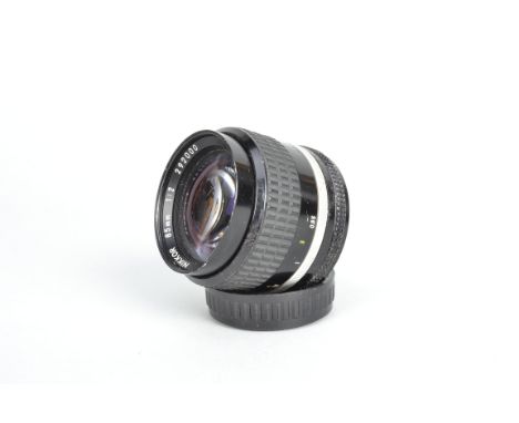 A Nikon Nikkor 85mm f/2 AI-S Lens, serial no 292000, barrel F, dent to filter ring, elements F-G, slight edge fungus