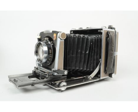 A Linhof Super Technika 4 x 5in Model V Folding Field Camera, serial no 2 112 851, body G, with a Carl Zeiss Planar 135mm f/3