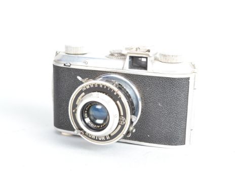 A Pontiac Baby Lynx Camera, made in French Morocco, shutter working, timer sticking, body G, some metal tarnishing, with Flor