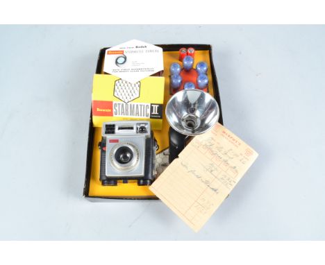 A Kodak Brownie Starmatic Outfit, in original box, with original packaging, Starmatic camera, flash unit, bulbs, batteries, c