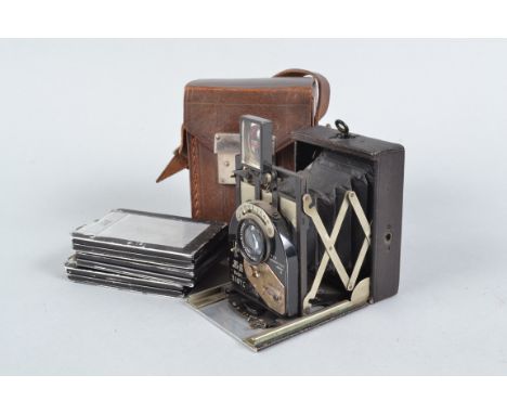 A Newman &amp; Guardia Baby Sibyl Folding Plate Camera, 6 x 4.5cm format, body G, shutter not working, a Carl Zeiss Jena Tess