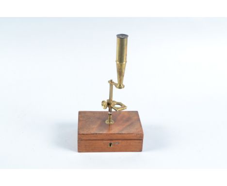 An early 19th Century lacquered brass Cary-Gould's Improved Pocket Compound Microscope of medium size,  with objectives, slid