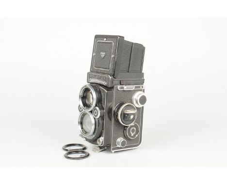 A Rolleiflex 2.8F K7F2 TLR Camera, serial no 2 456 744, circa 1966, 12/24 frame counter, body G, shutter working, meter respo