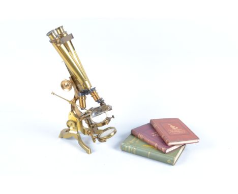 A late 19th Century lacquered brass Wale-Limb Compound Binocular Petrological Microscope,  with two eyepieces, two objectives