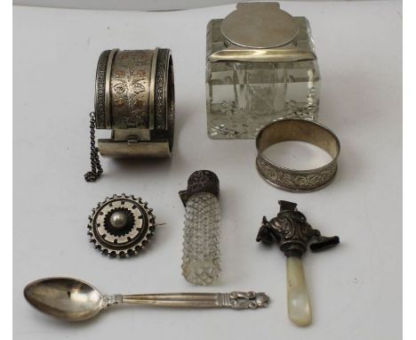 A Georg Jensen Denmark silver coffee spoon, together with a silver mounted glass inkwell, a silver napkin ring, a Victorian b