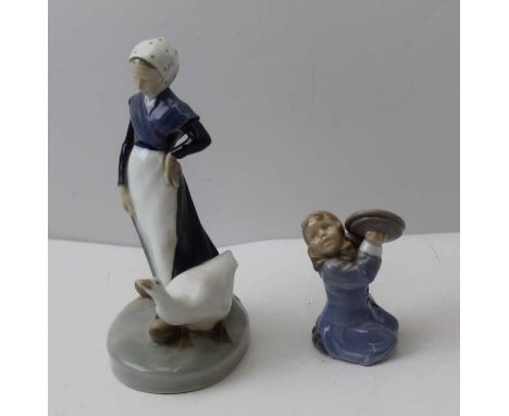 A Royal Copenhagen ceramic goose girl (528) 18 cm high, together with one other smaller girl with cymbals (3677).&nbsp;