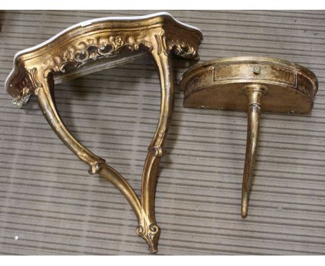 Two small gilded console tables, the largest having later painted top, 56cm diameter