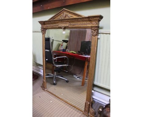 A 19th century gilt gesso framed overmantle mirror, architectural pediment on columns. Plate glass 113 x 88 cm.&nbsp;
