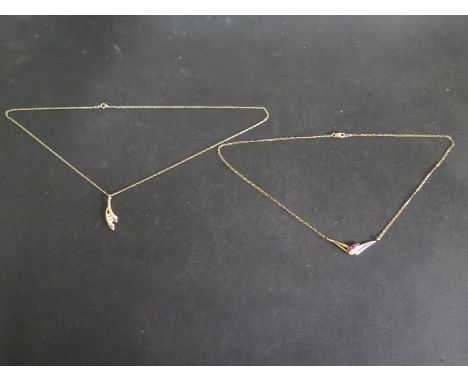 A 9ct Yellow Gold Ruby and Diamond Chip Pendant on a 9ct Yellow Gold Chain - length 42cm and a 9ct Yellow Gold Diamond three 