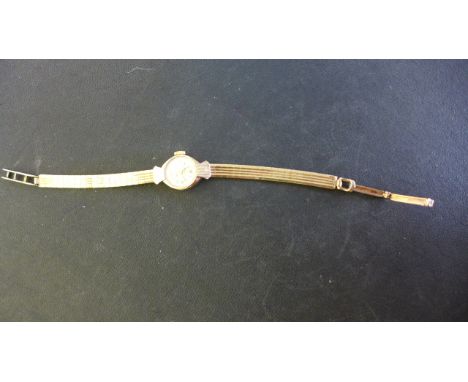 A 9ct Yellow Gold Chateau Manual Wind Ladies Wristwatch, 16mm wide including button, working in saleroom, some wear to glass 