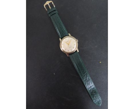 A 9ct Yellow Gold Longines Automatic Gents Presentation Wristwatch, 36mm wide, including button with a new strap, working in 